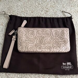Coach Perforated “C” Pearlescent Beige Wristlet